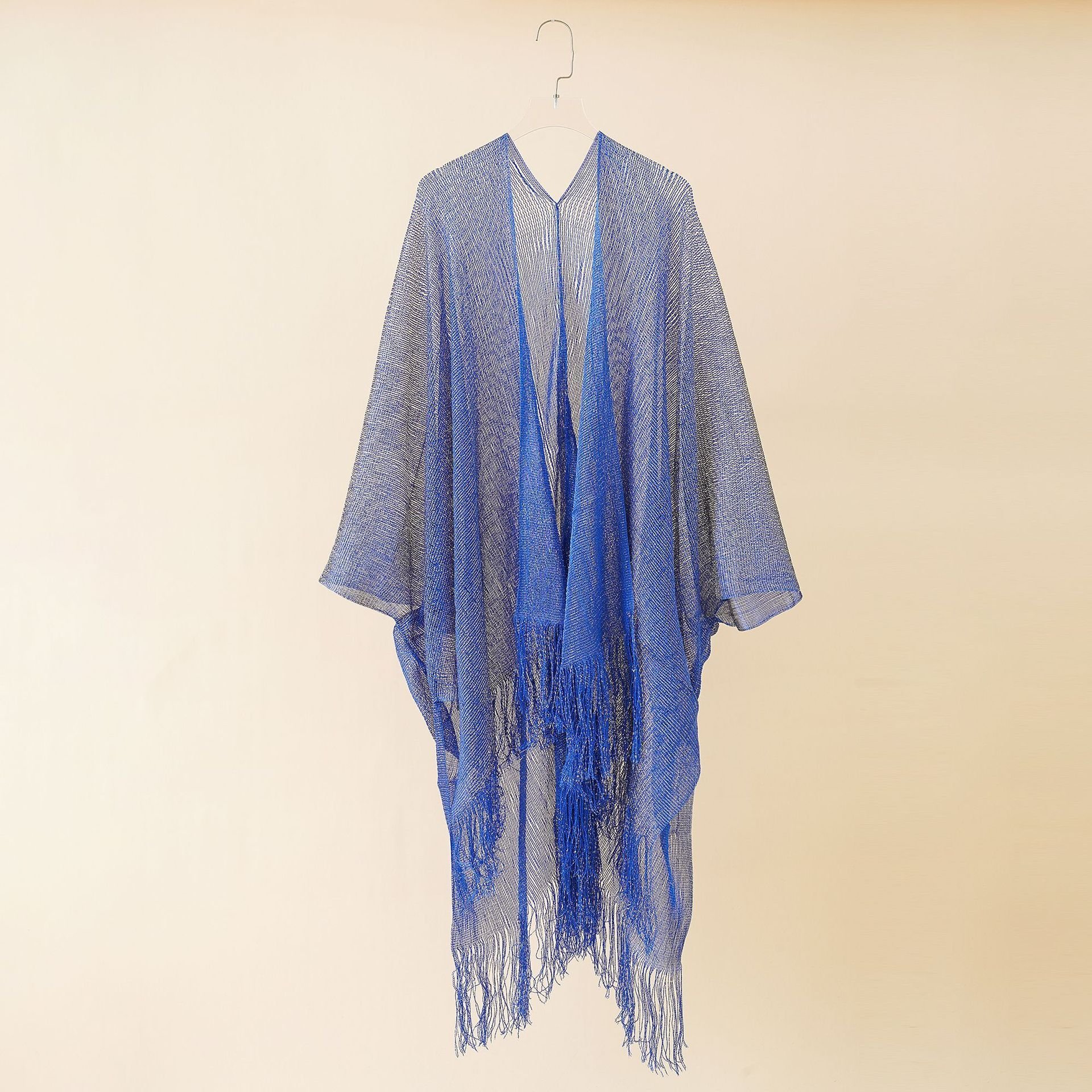 European and American beach bikini jacket sexy tassel shawl women knitted wind cape style sun protection blouse