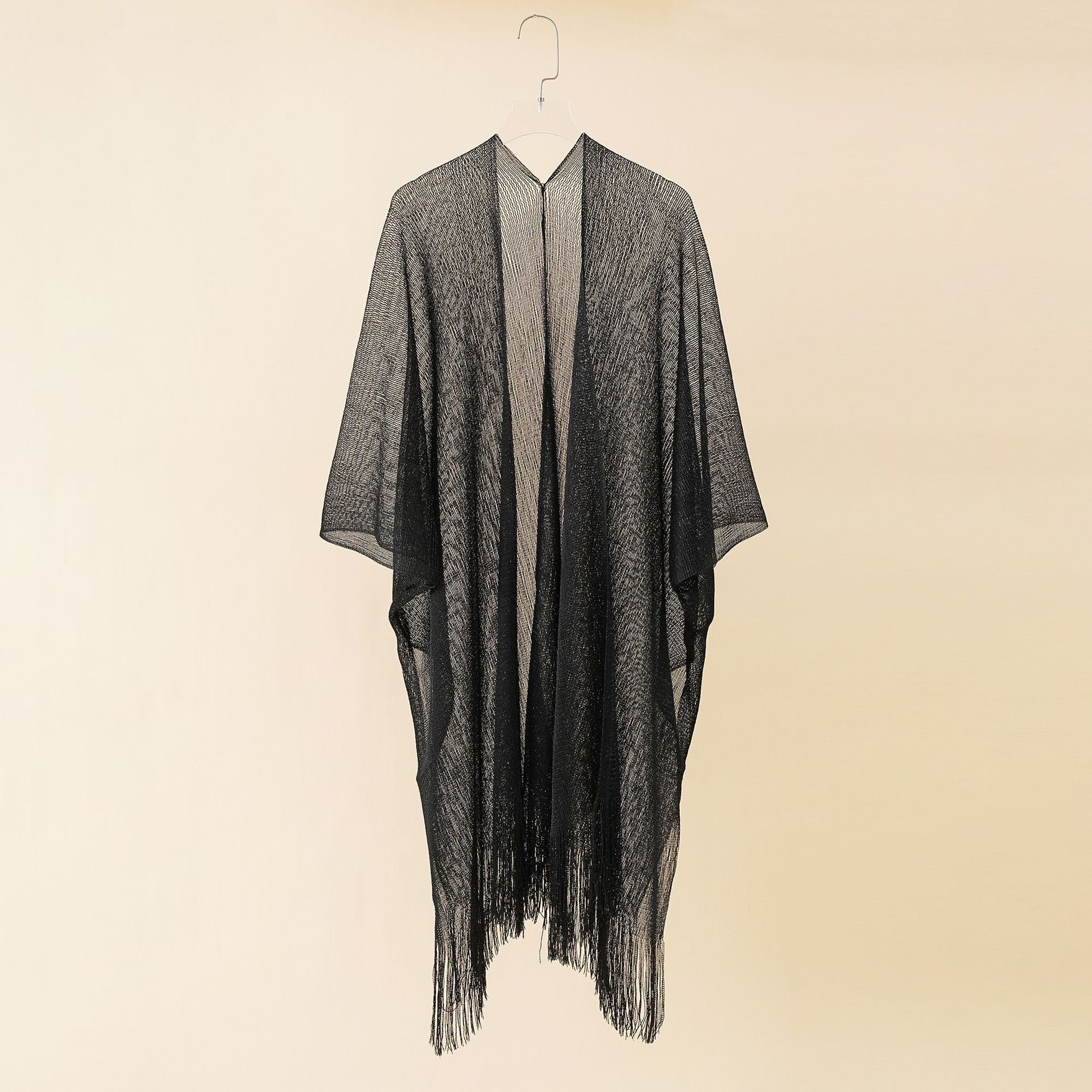 European and American beach bikini jacket sexy tassel shawl women knitted wind cape style sun protection blouse