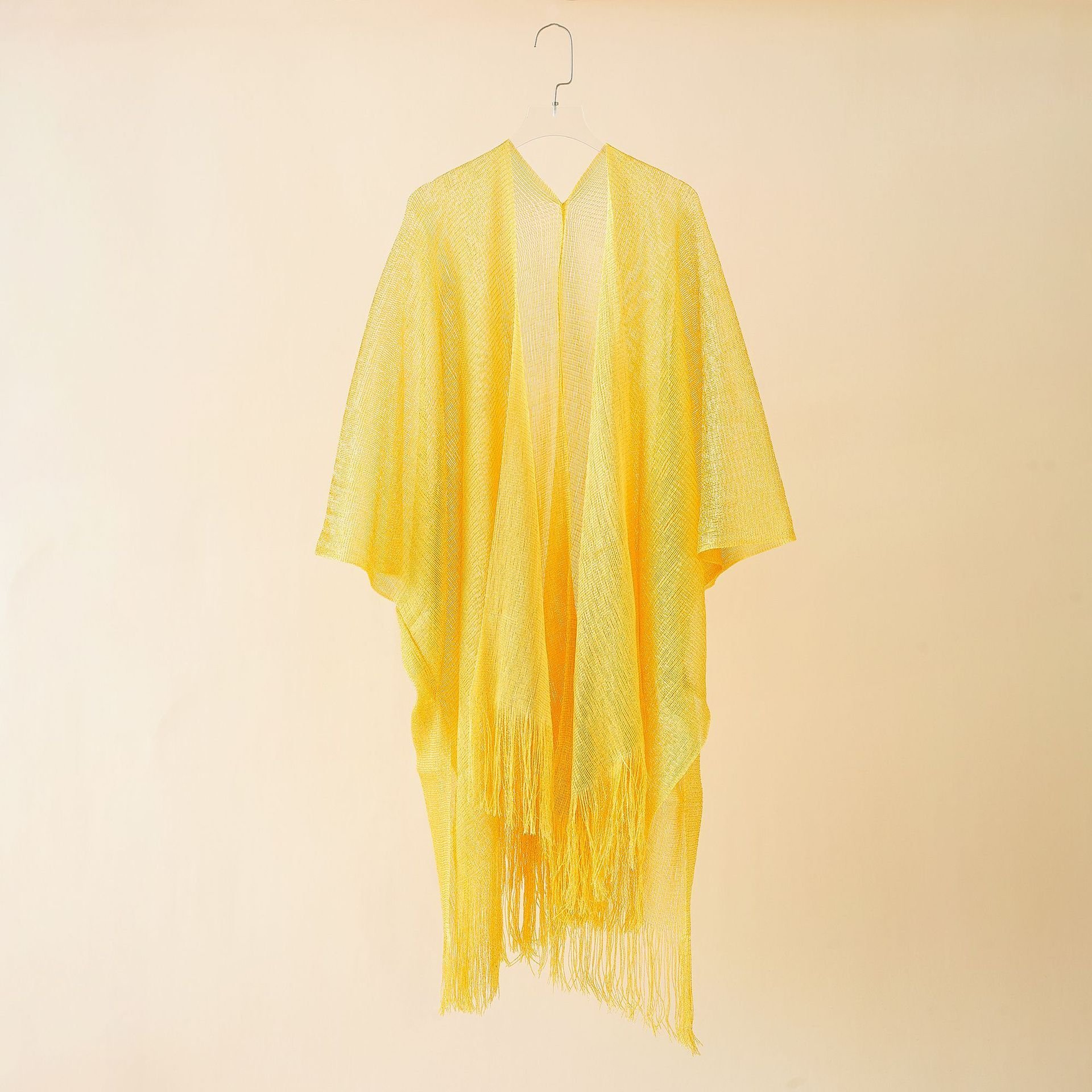European and American beach bikini jacket sexy tassel shawl women knitted wind cape style sun protection blouse