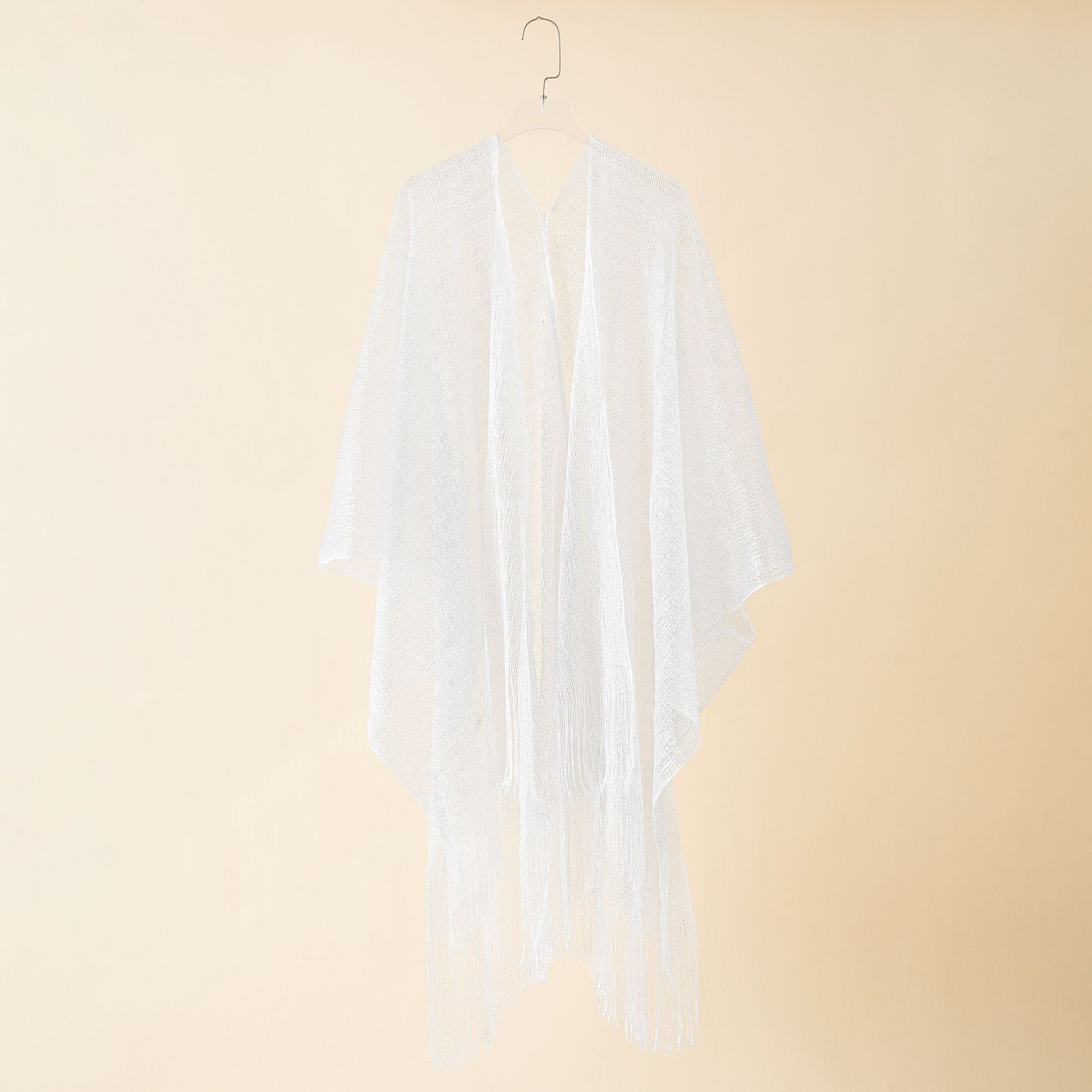 European and American beach bikini jacket sexy tassel shawl women knitted wind cape style sun protection blouse