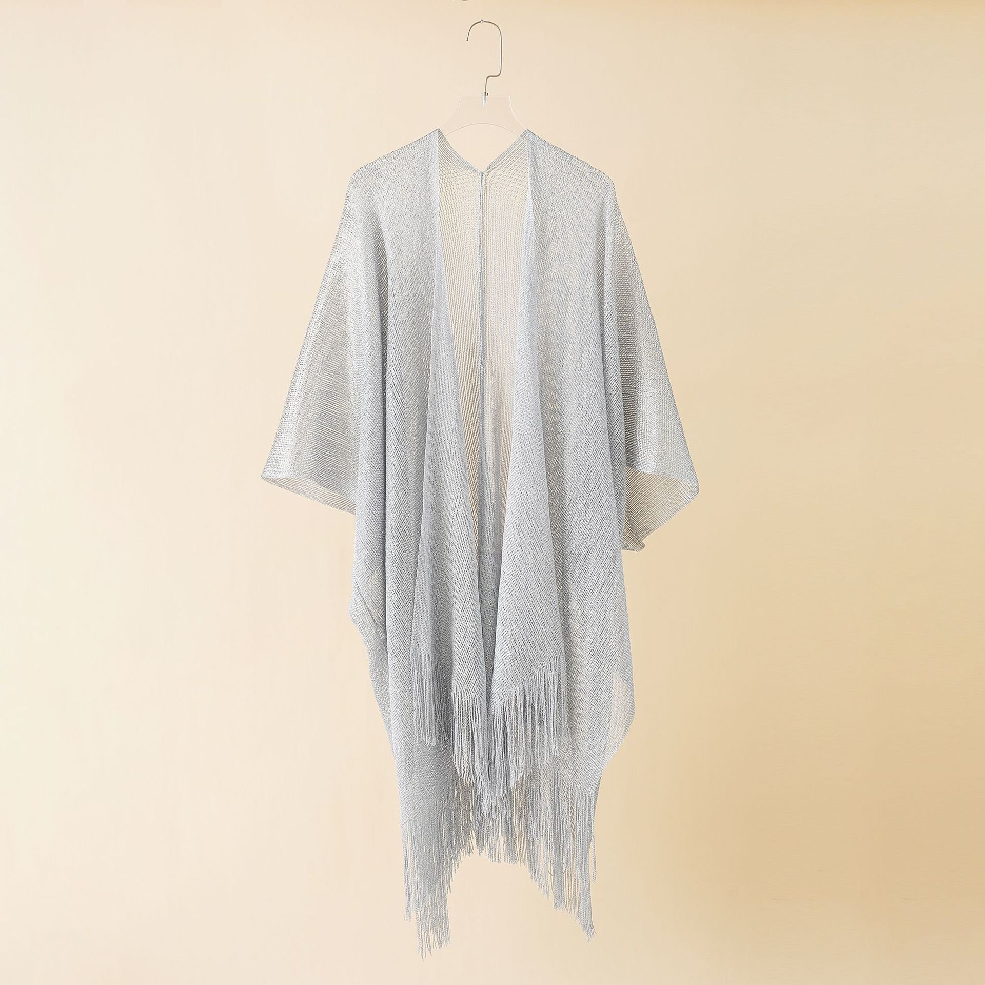 European and American beach bikini jacket sexy tassel shawl women knitted wind cape style sun protection blouse