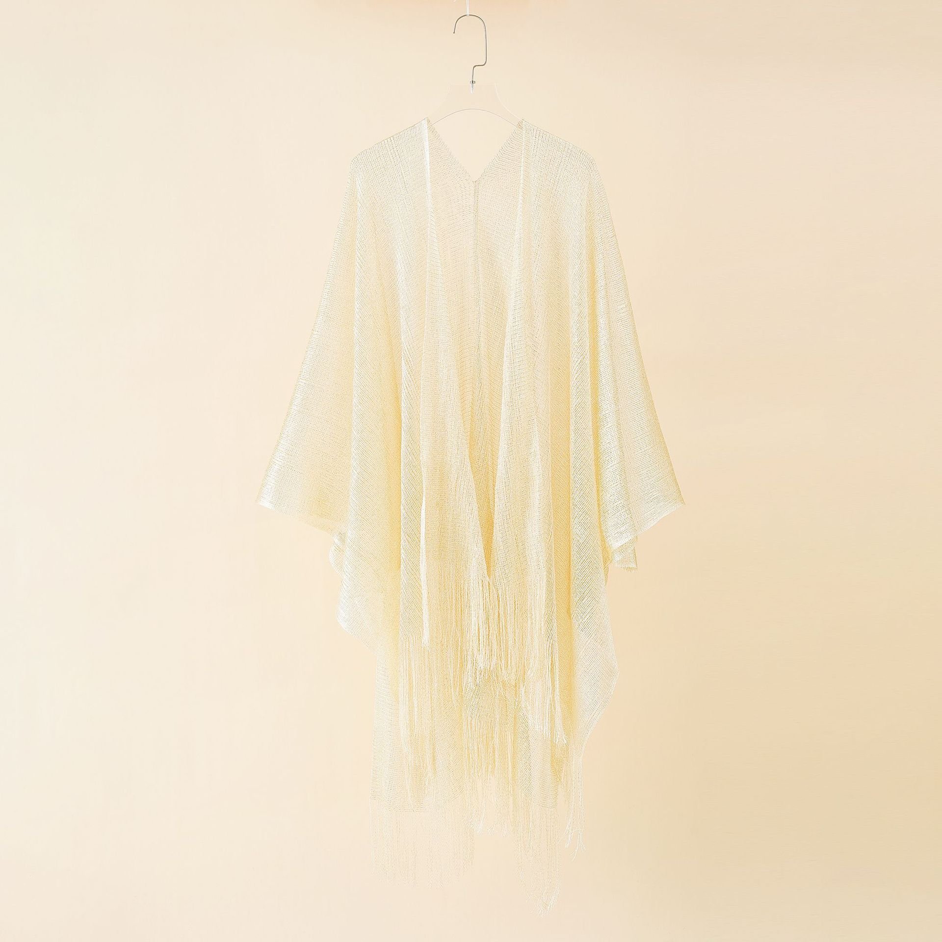 European and American beach bikini jacket sexy tassel shawl women knitted wind cape style sun protection blouse